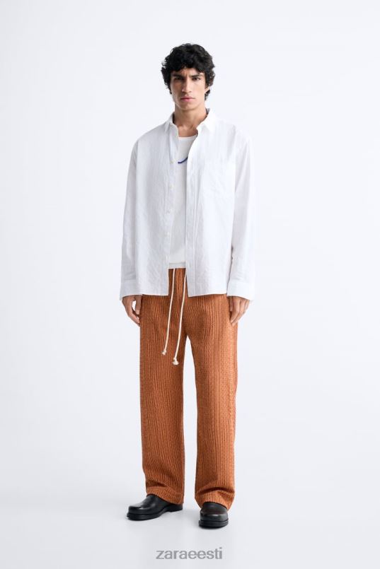 Zara geomeetrilised žakaarpüksid mehed ekru/kollane Riietus 42F0H961