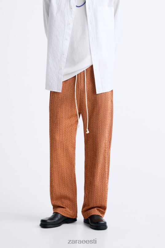 Zara geomeetrilised žakaarpüksid mehed ekru/kollane Riietus 42F0H961