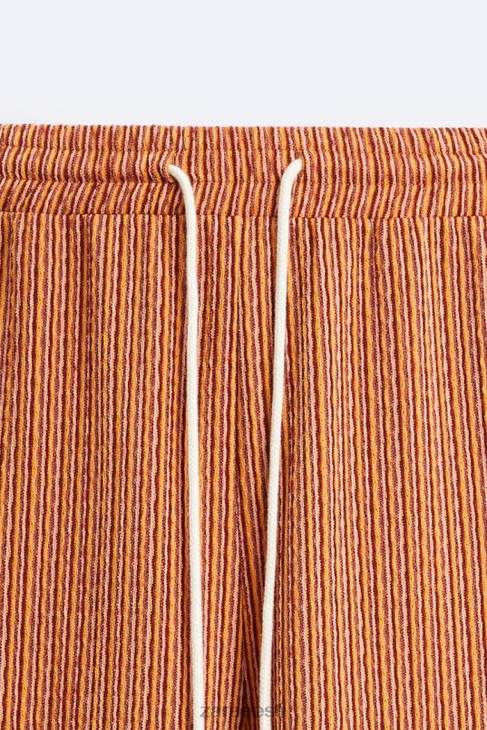 Zara geomeetrilised žakaarpüksid mehed ekru/kollane Riietus 42F0H961